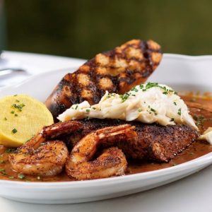 Coraline’s Redfish Court Bouillon is a delectable dish of fresh seafood prepared with New Orleans-inspired flair and flavors. Photo credit: Beau Rivage
