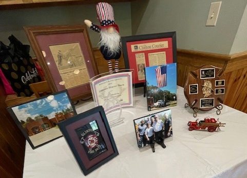 Memorabilia from his career is displayed during a retirement reception for Fire Chief Jeff Blackledge.