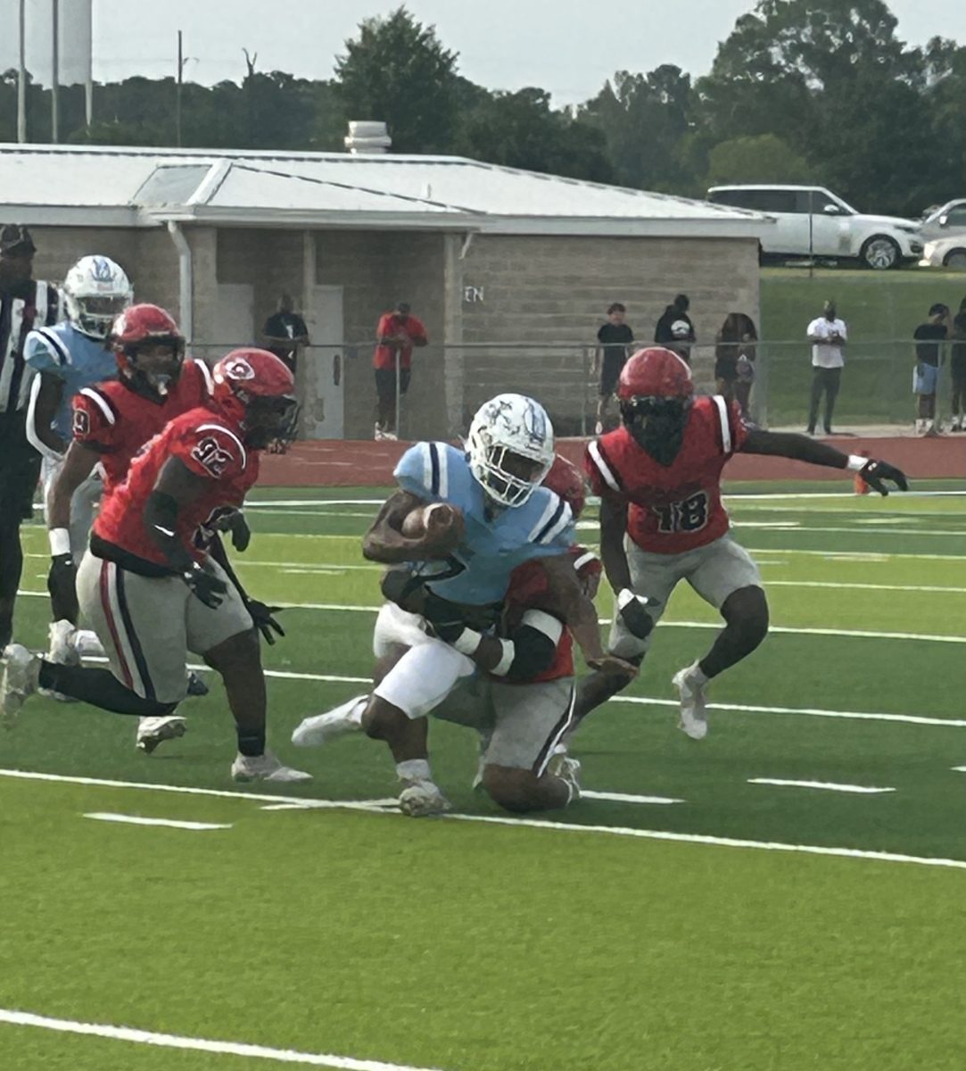 Arrow defenders Christian Cavett (#92) and Trevis Coley (#18) move in to tackle a Ridgeland ball carrier in a spring scrimmage in Ridgeland.