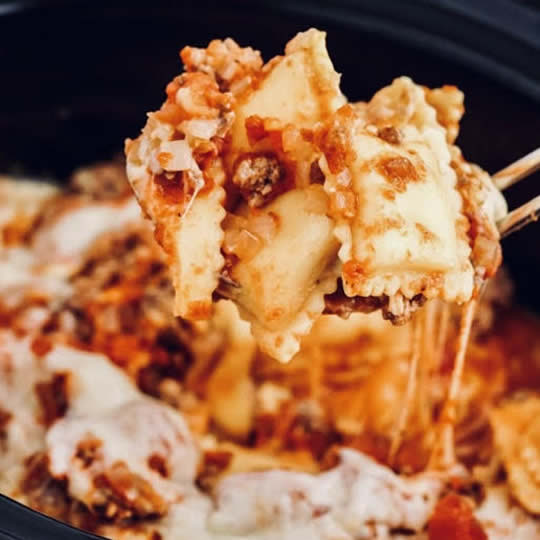 Crockpot Ravioli Lasagna is the perfect antidote to a chilly winter night when time is short but dinner must still be served. 