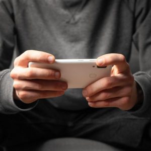 man holding phone.