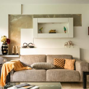 gray couch with throw pillows