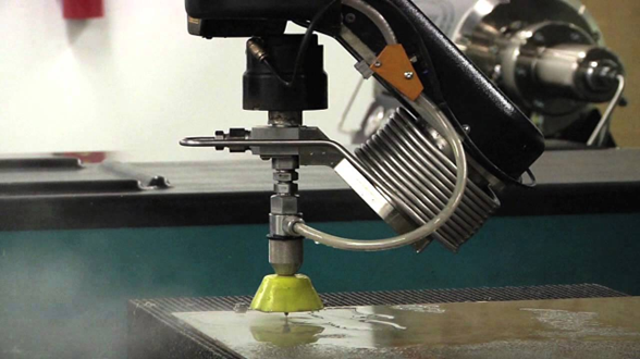 close-up of a waterjet cutter machine