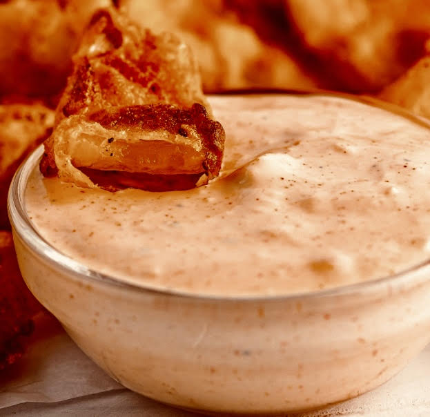 A copycat version of the famous Blooming Onion Sauce also doubles as a delicious dip for onion rings, fries and chips.