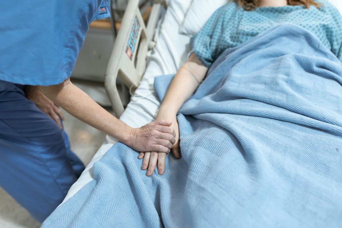 someone laying in the hospital bed