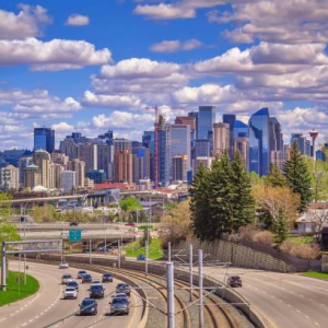 highway with cars and buildings