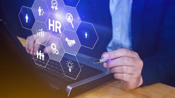 business man on laptop with HR written in space