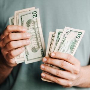 man counting money