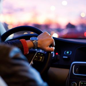 a man driving a car