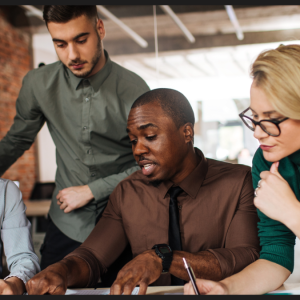 Team of employees working together in the office