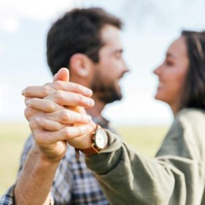 man and woman holding hands