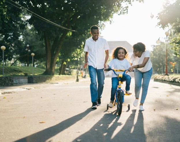 family walking in a park