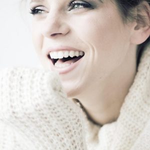 woman smiling with confidence