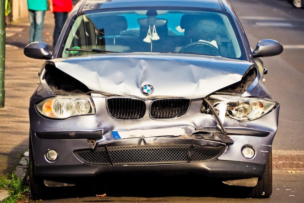 silver bmw car wrecked