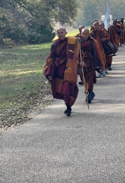 Buddhist monks on a Walk for Peace head north along the Natchez Trace on December 9, 2025.