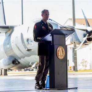 Lt. Gen. Lawrence "Gil" Ferguson, U.S. Army Special Operations Command (USASOC) commanding general, speaks to attendees during the USASOC Assumption of Command ceremony inside the USASOC hangar at Fort Bragg, North Carolina.