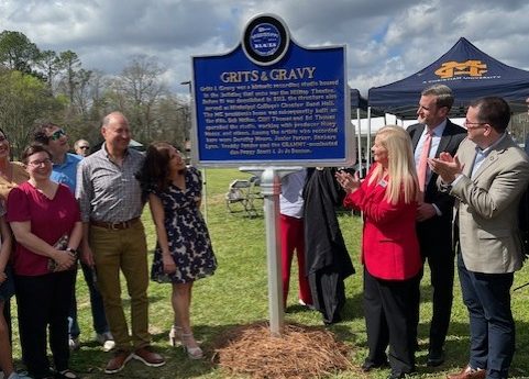 A Mississippi Blues Trail marker honoring the Grits and Gravy studio is unveiled during a ceremony March 5.