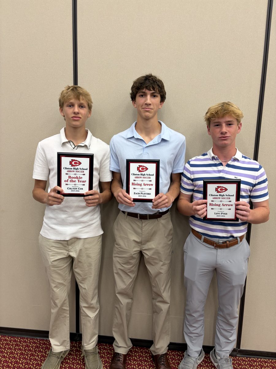 Pictured (l to r) with their awards are Colton Cox, who was named Rookie of the Year; and Zach Pletzke and Levi Fyke, who received Rising Arrow Awards.