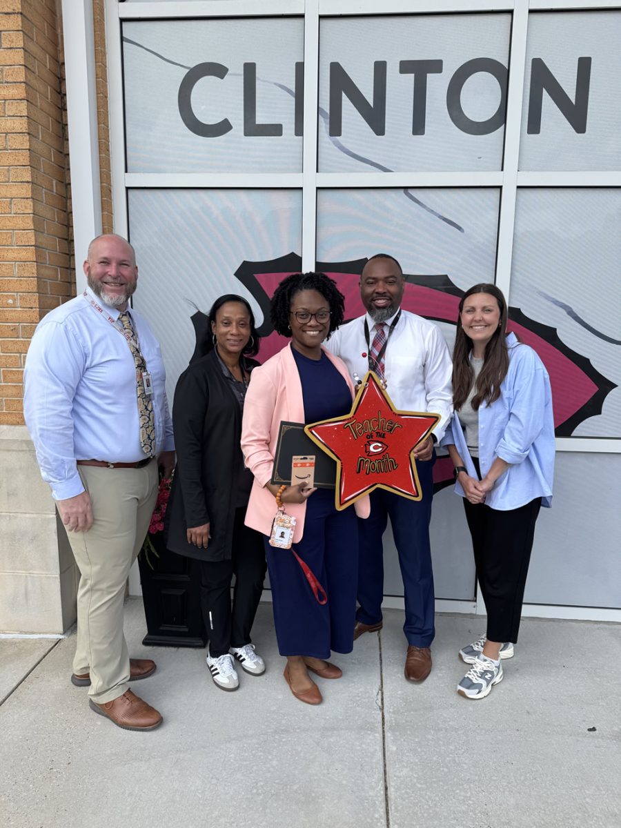 Clinton Junior High School recently honored Mrs. Kimple (center) as the school’s Teacher of the Month. 