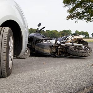 Motorbike Accident on the road with a car