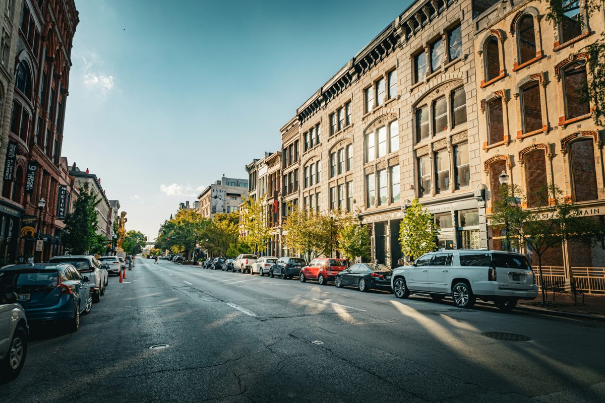 a city street with tall buildings