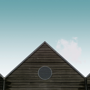 roof peak of house with teal sky