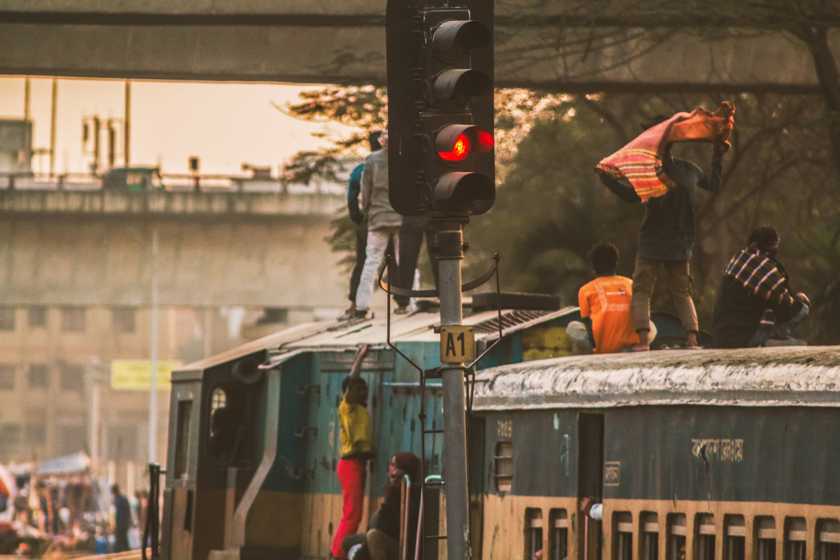 kids playing on top of a train