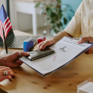 Elderly discussing visa application with professional