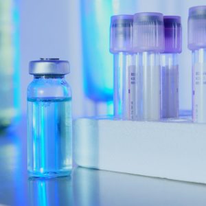 Glass vials with clear fluid, courtesy of Artem Podrez on Pexels