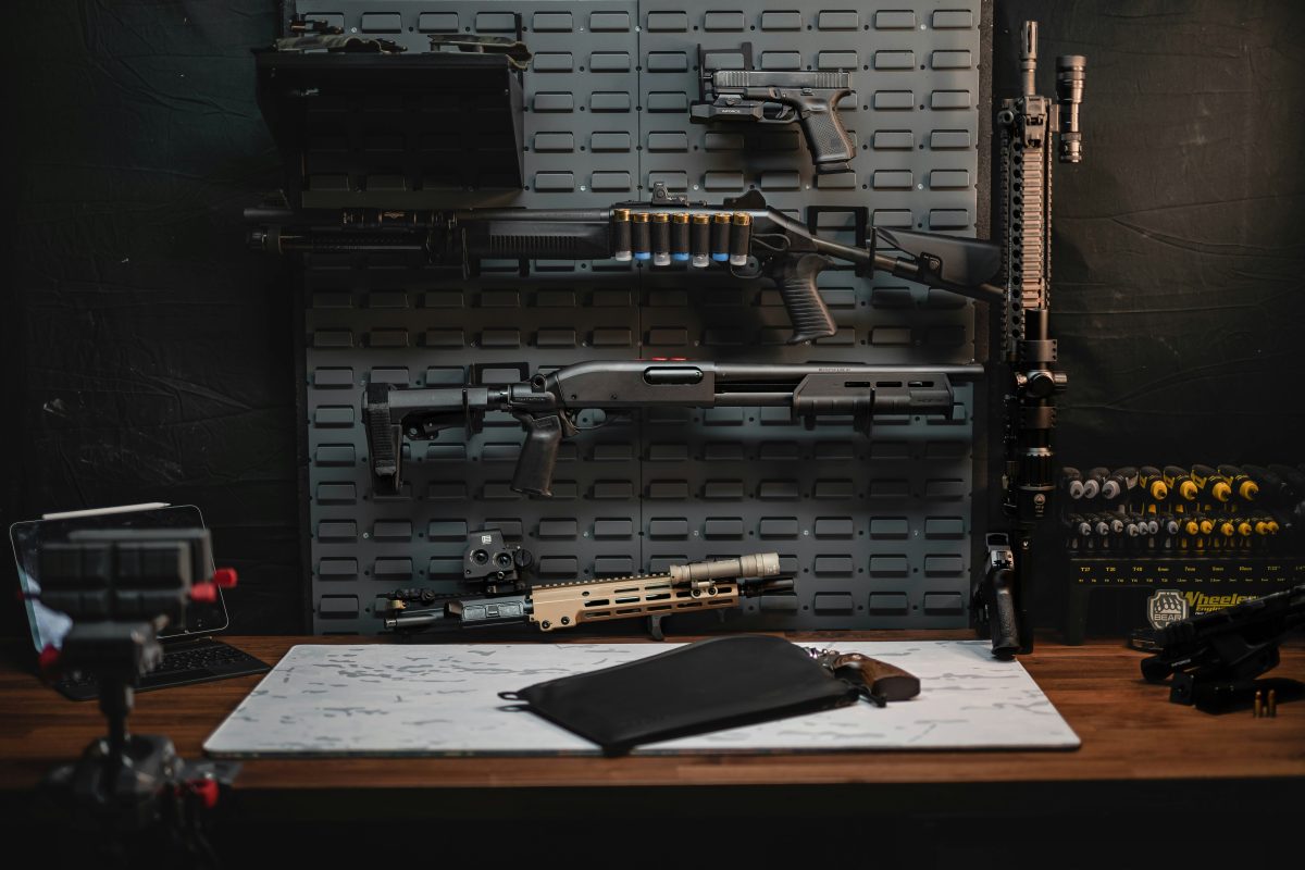 guns and ammo on table