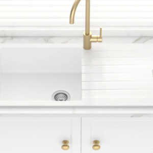 white kitchen sink with drainer