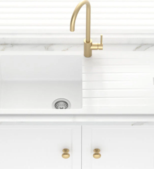white kitchen sink with drainer