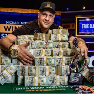 Michael "The Grinder" Mizrachi laying on money