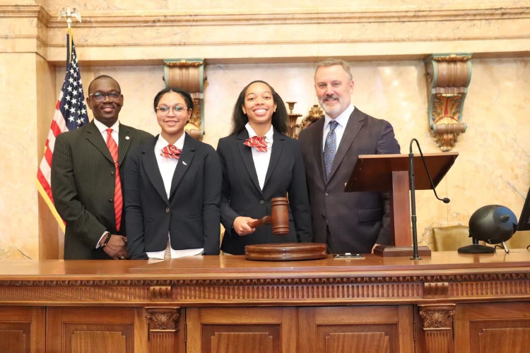 Pictured (l to r) are Representative Rickey Thompson, Ricki Williams, Keziah Kimple and Speaker of the House Jason White. Representative John Hines (not pictured) sponsored their visit.