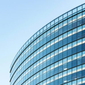 white and blue glass walled building