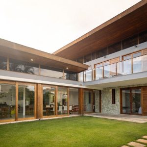 modern luxury house with glass windows and wooden finish