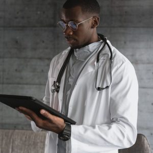 doctor holding a tablet