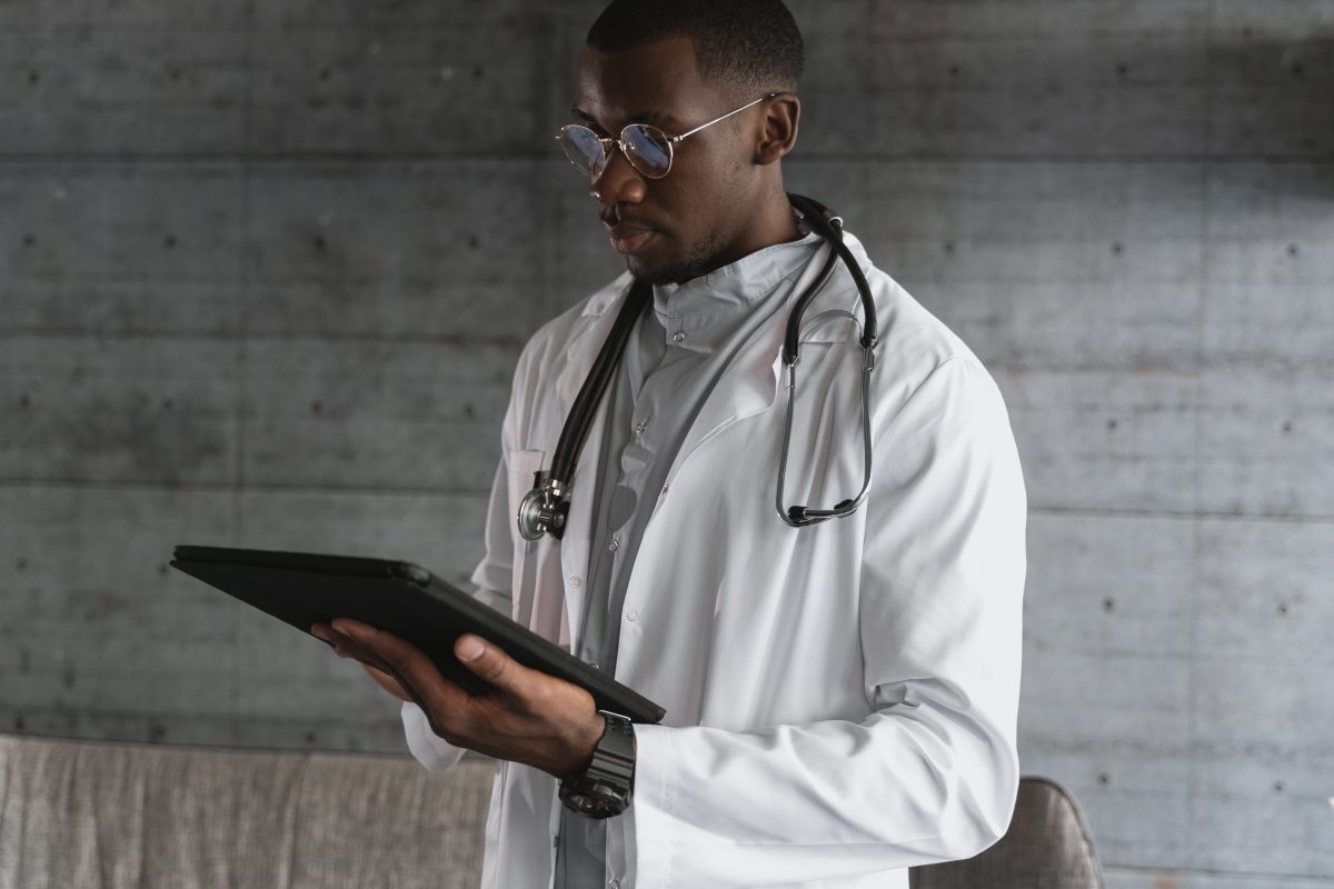doctor holding a tablet