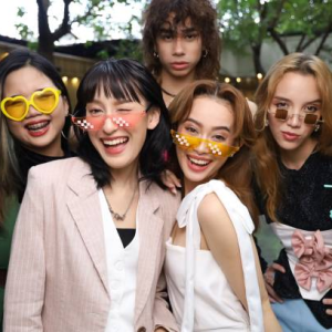 women posing for the camera with glasses