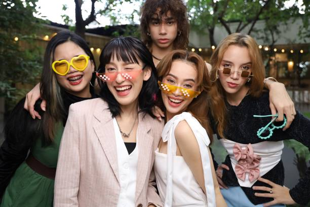 women posing for the camera with glasses