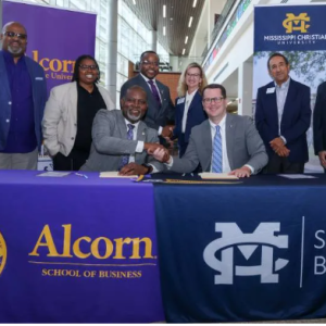Leaders from Alcorn State University and Mississippi Christian University gather following the June 30 signing of a Memorandum of Understanding establishing an accelerated 4+1 Master of Accountancy pathway between the two institutions. Seated, from left, Dr. Tracy M. Cook, president of Alcorn State University; and Dr. Blake Thompson, president of Mississippi Christian University, and standing from left, Dr. Edmund Buckner, ASU associate provost for research and innovation; LaTuesday Guy, ASU program coordinator; Dr. Antwon Woods, dean, ASU School of Business; Dr. Stephanie Busbea, MC interim provost; Dr. Marcelo Eduardo, dean, MC School of Business; and Dr. Billy Morehead, MC program coordinator.