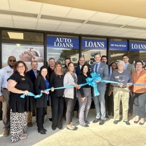 First Metropolitan Financial Services has ribbon cutting