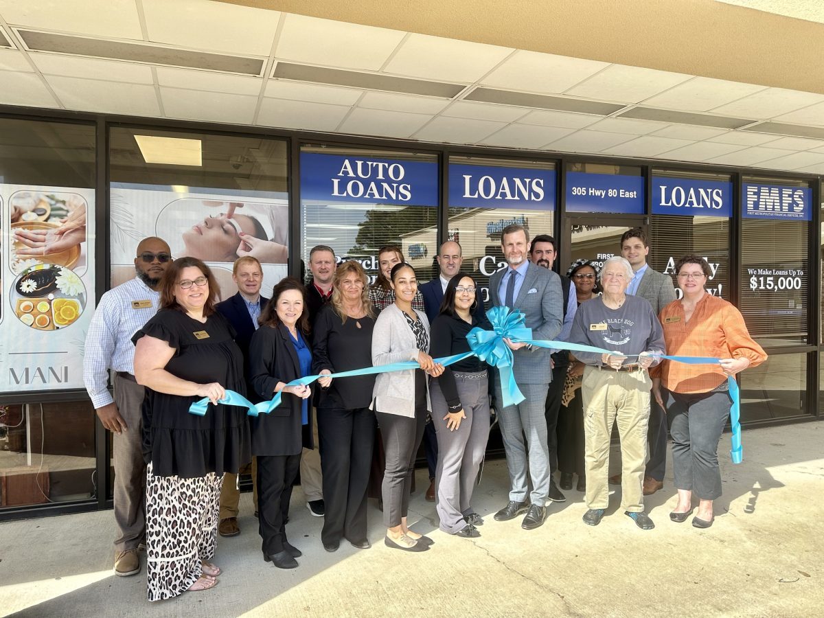 First Metropolitan Financial Services has ribbon cutting