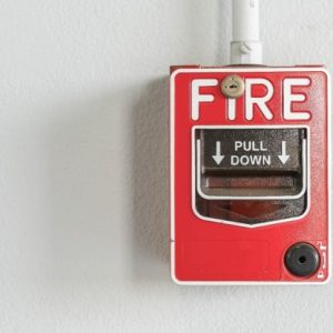 close up of fire alarm on wall