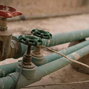 close up of turn off valves of pipes