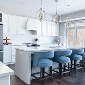 modern kitchen with blue bar stools