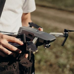 person holding dji mavic drone