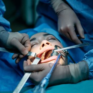 woman patient getting dental work done