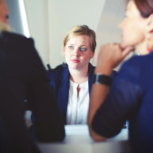 professional women sitting at a table