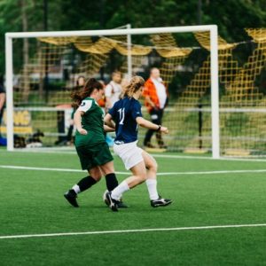 girls play soccer